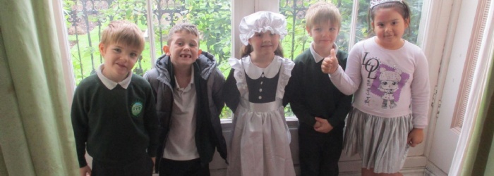 Exwick Heights School Pupils dressing up in old fashions clothes at Powderham Castle